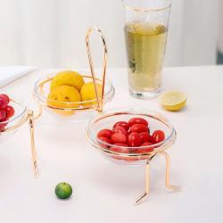 Два маленьких десертных блюдца на позолоченной подставке